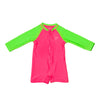 Photo of infant/toddler neon pink and neon green rash guard one piece. The rash guard one piece features a zipper for easy on off and snaps for speedy diaper changes.